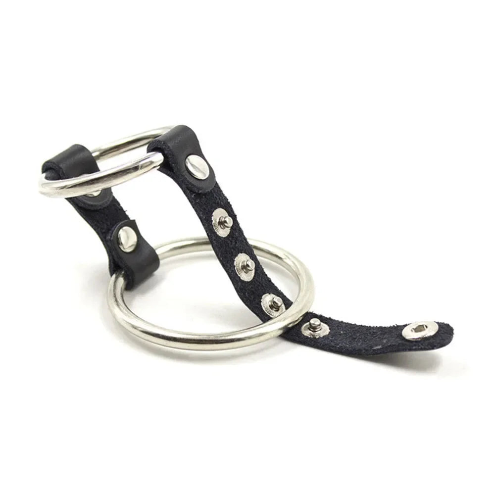 ManJoy male leather penis rings designed as a cock and ball stretcher with bondage strap for enhanced male pleasure and BDSM play