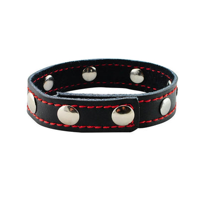 ManJoy male leather penis rings designed as a cock and ball stretcher with bondage strap for enhanced male pleasure and BDSM play